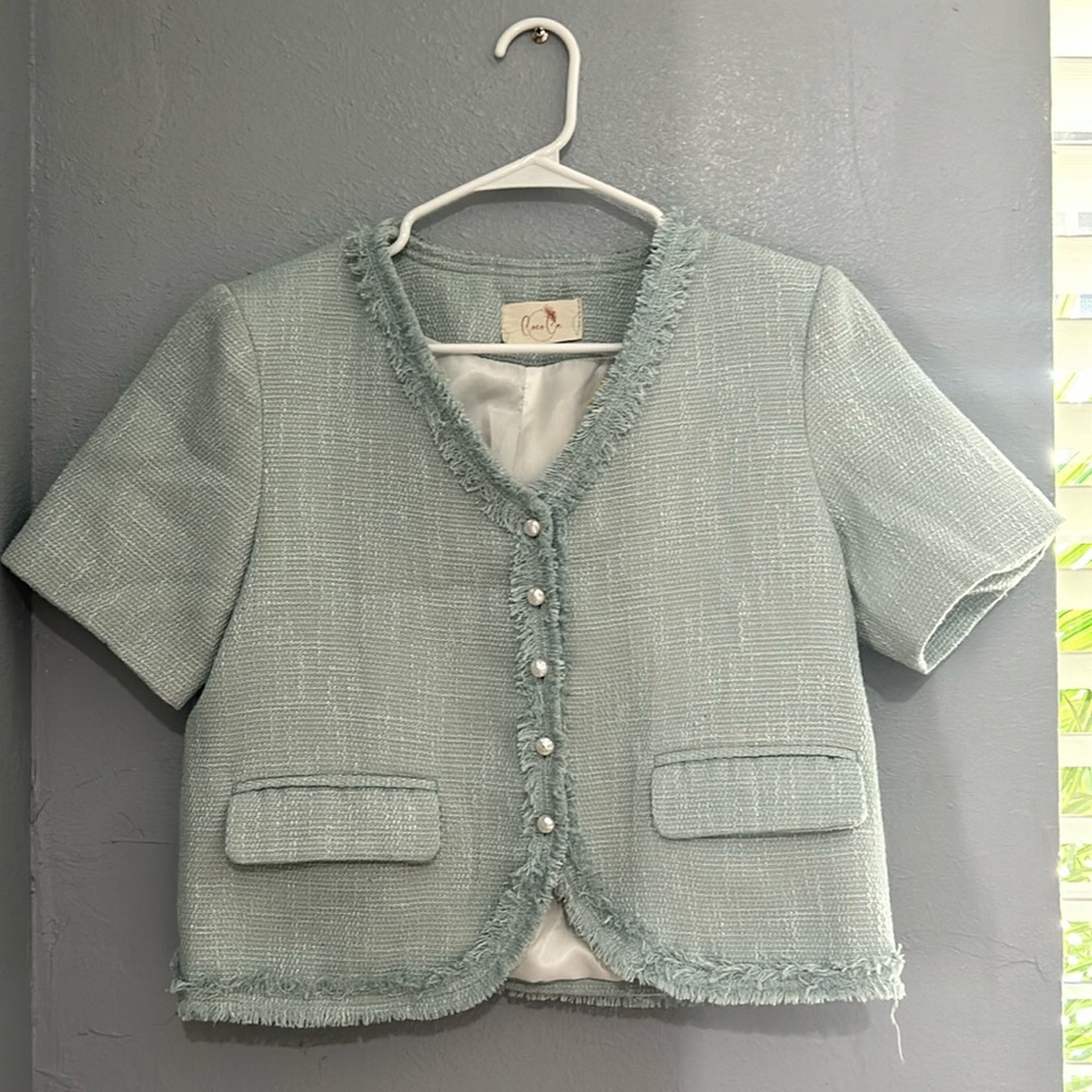 Two piece jacket and skirt.  Woven basket weave